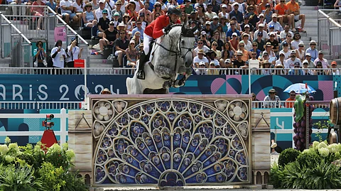 Christian Kukuk ja Checker voittivat Pariisissa henkilökohtaisen kultamitalin.